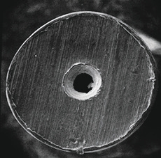 tubing-end-with-commercial-cutter Rough end of stainless steel tubing cut with commercial cutter