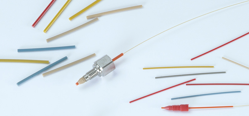 Sleeves to connect capillary tubing into standard fluidic ports